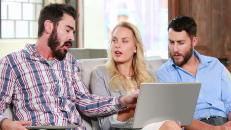 Casual-business-team-having-a-meeting-on-the-couch