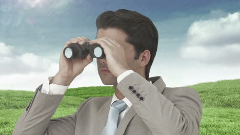Businessman-looking-through-binoculars-against-green-field