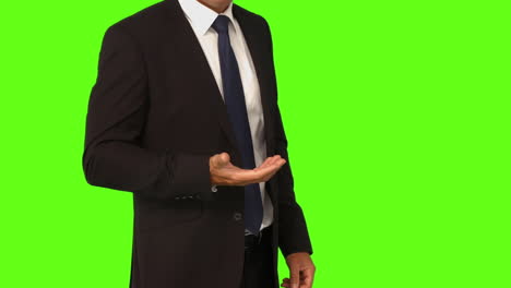 Businessman-standing-with-hand-out