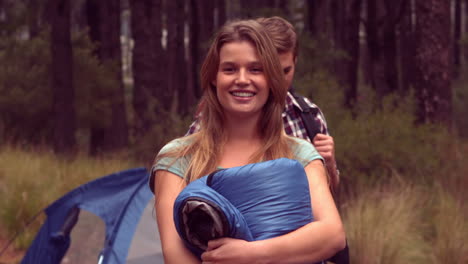 Couple-setting-up-their-tent-for-the-night