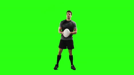 Serious-rugby-player-with-ball-