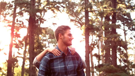 Couple-hugging-beside-their-tent