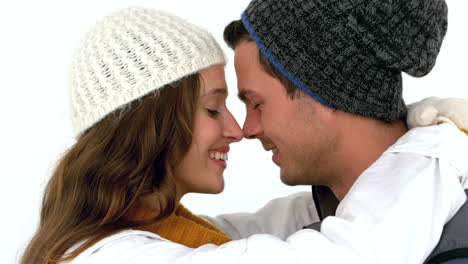 Happy-couple-in-winter-clothes-nose-to-nose