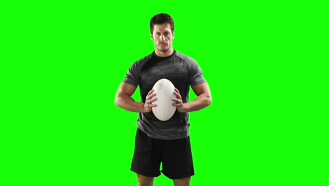 Serious-rugby-player-with-ball-