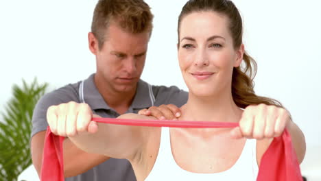 Patient-using-resistance-band-at-physiotherapy