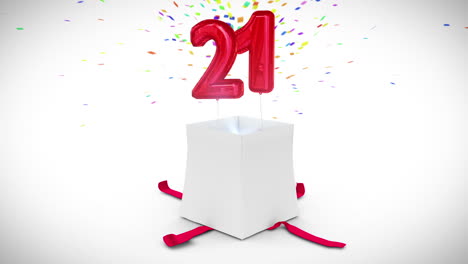 Digital-animation-of-birthday-gift-exploding-and-revealing-number-twenty-one