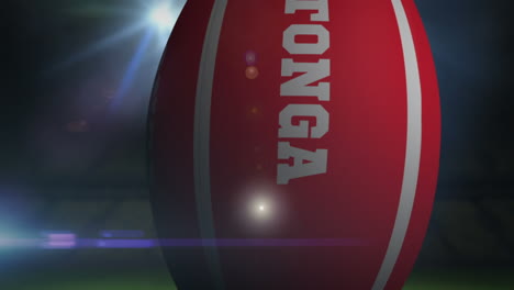 Tonga-rugby-ball-in-stadium-with-flashing-lights-