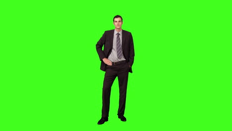 Businessman-standing-with-hand-on-hip
