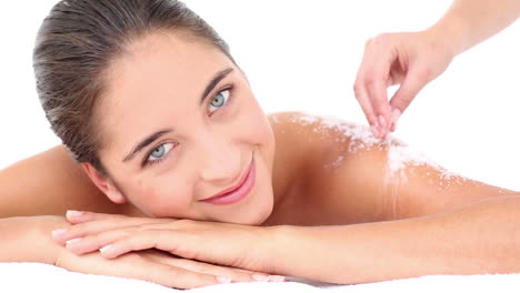 Pretty-woman-enjoying-a-salt-scrub-massage