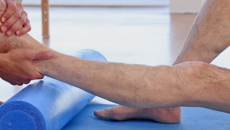 Doctor-massaging-his-patients-ankle