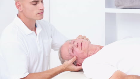 Doctor-massaging-his-patients-head