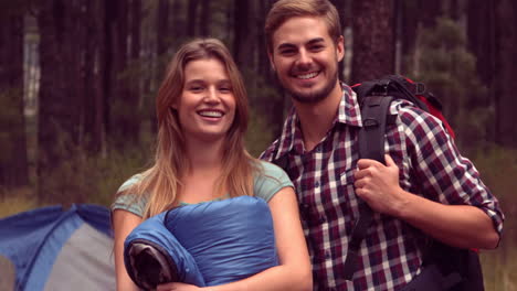 Couple-setting-up-their-tent-for-the-night