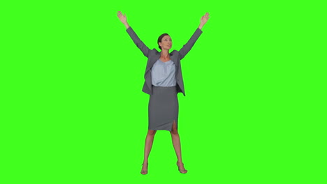 Businesswoman-standing-with-arms-raised