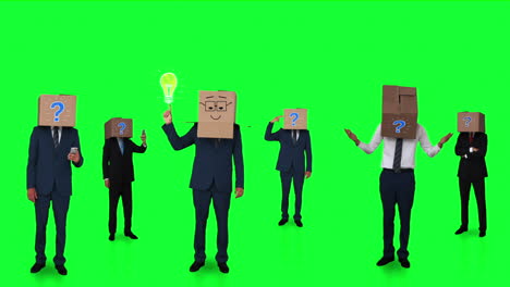 Team-of-businessman-hiding-head-with-box-