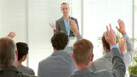 Business-people-asking-question-during-meeting