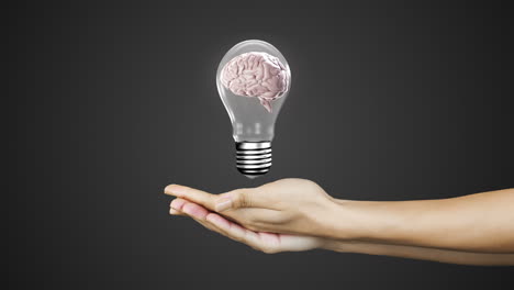 Hands-presenting-light-bulb-with-brain