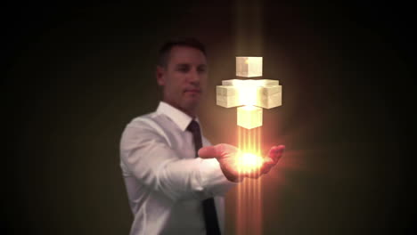 Businessman-presenting-holographic-cubes