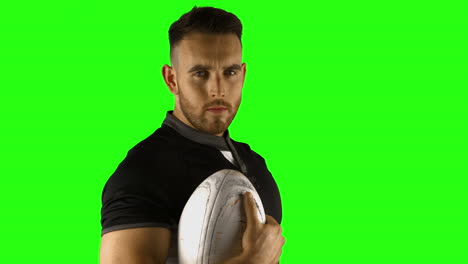 Serious-rugby-player-with-ball-