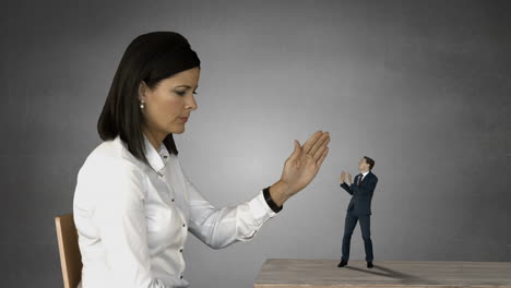 Giant-businesswoman-yelling-on-scared-businessman-