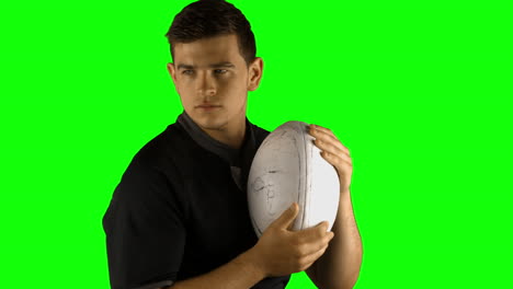 Serious-rugby-player-with-ball-