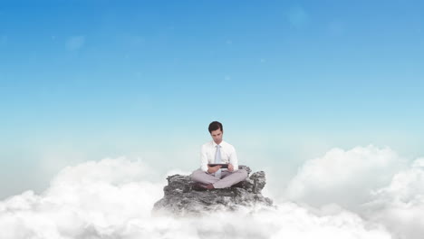 Businessman-using-tablet-in-the-clouds