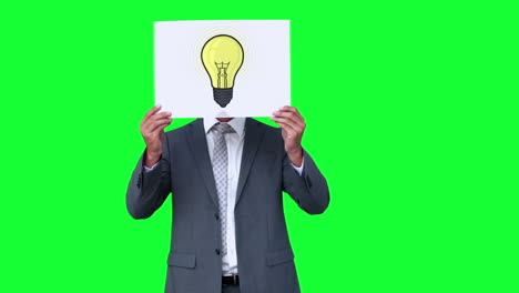 Businessman-holding-light-bulb-animation-over-face