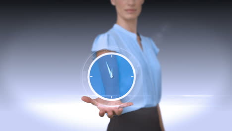 Businesswoman-holding-virtual-alarm-clock