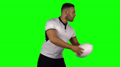 Ernsthafter-Rugbyspieler-Mit-Ball