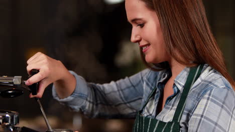 Smiling-waitress-making-cup-of-coffee