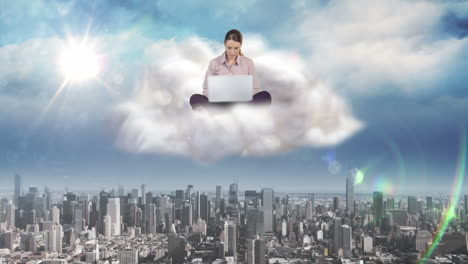 Businesswoman-using-laptop-on-cloud