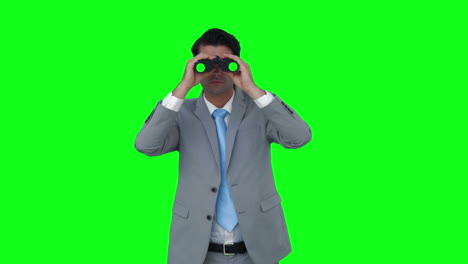 Businessman-looking-through-binoculars