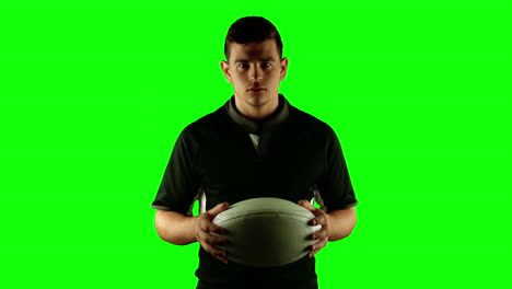 Serious-rugby-player-with-ball-