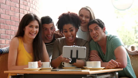 College-students-taking-selfie-in-campus-cafe