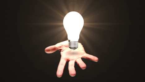Hand-presenting-light-bulb-