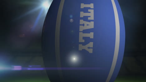 Italy-rugby-ball-in-stadium-with-flashing-lights-