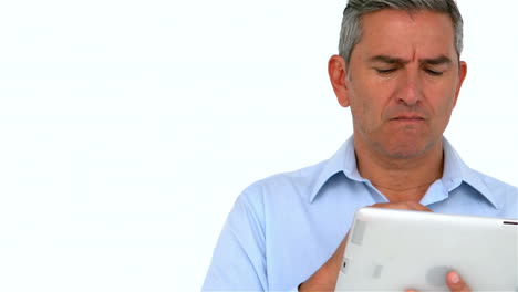 Thoughtful-man-using-tablet