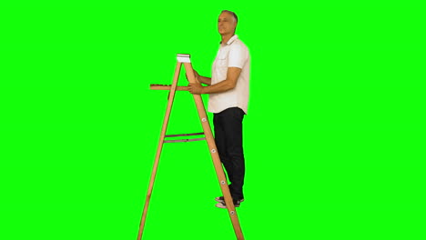 Casual-man-standing-on-ladder-