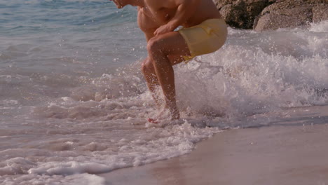 Athletic-man-running-into-the-sea