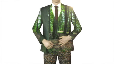 Businessman-standing-with-hands-on-hips-with-forest-overlay-