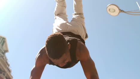 Young-man-doing-handstand-