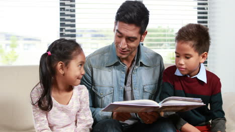 Father-reading-his-kids-a-story