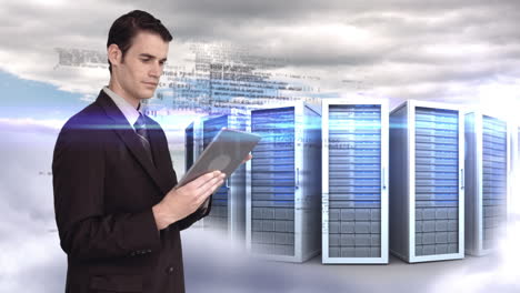 Businessman-using-tablet-computer-in-front-of-server-tower-on-sky-background