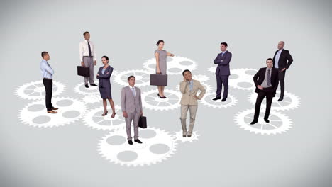 Business-people-standing-on-moving-cogs-and-wheels