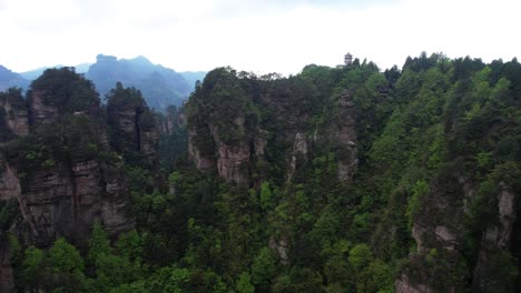 Magnificent-establisher-aerial-shot-of-Zhangjiajie-National-Forest-Park-cliifs-in-China