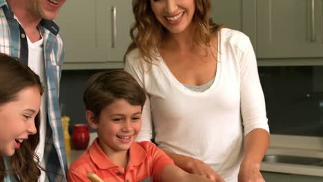 Cute-family-preparing-a-salad