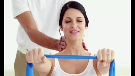 Pregnant-woman-working-out-with-instructor