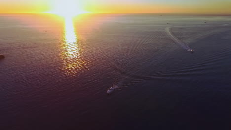 Aerial-view-of-boats-are-sailing-in-ocean-