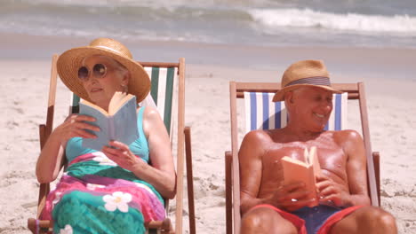 A-group-of-mature-friends-are-sitting-on-a-deck-chair