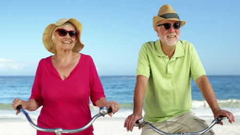 Senior-couple-going-for-a-bike-ride