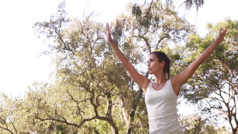 Young-woman-performing-stretching-exercise